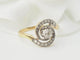 Bague 54.5 Bague tourbillon en or jaune et blanc 18 kt et diamants 58 Facettes 33317