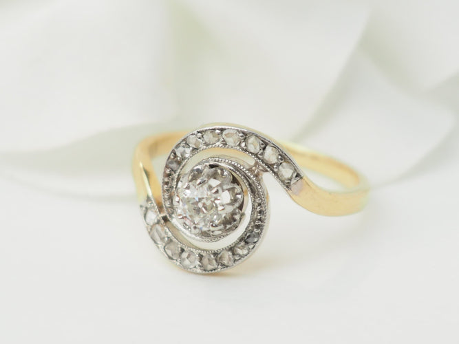 Bague 54.5 Bague tourbillon en or jaune et blanc 18 kt et diamants 58 Facettes 33317