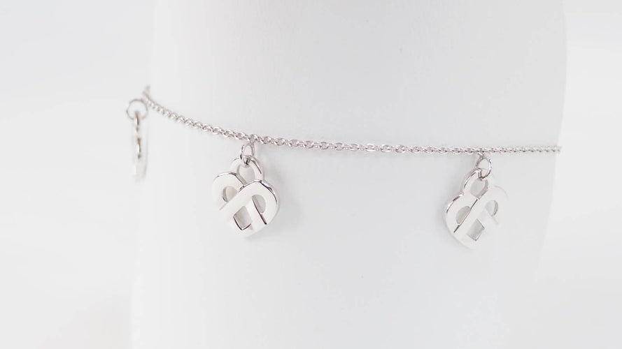 Bracelet Poiray Cœur Entrelacé - Bracelet en or blanc 58 Facettes 32973