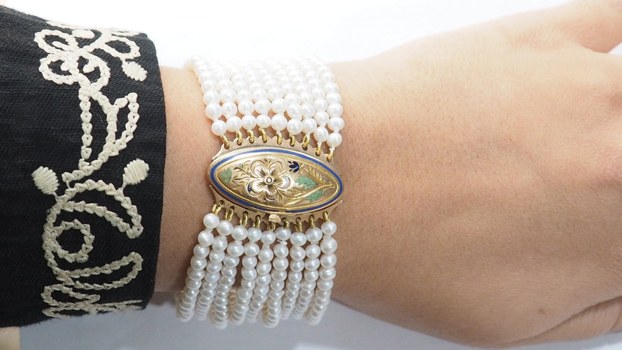 Bracelet Bracelet ancien 9 rangs en or jaune et perles de culture 58 Facettes 29041