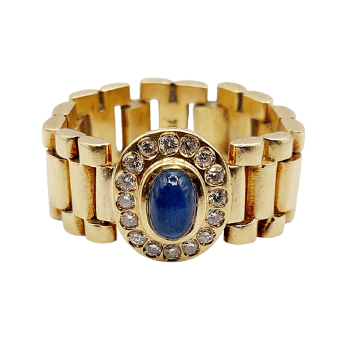 Flexible 18k gold ring with cabochon sapphire and diamonds 