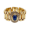 Flexible 18k gold ring with cabochon sapphire and diamonds 
