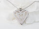 Collier Collier cœur en or blanc 18k et diamants 58 Facettes 33084