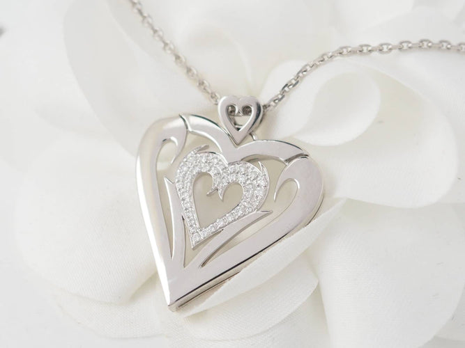 Collier Collier cœur en or blanc 18k et diamants 58 Facettes 33084