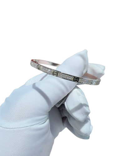 Cartier Love - Small model bracelet in rose gold set with diamonds 