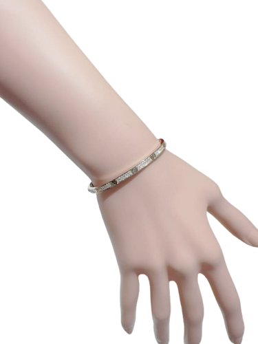 Cartier Love - Small model bracelet in rose gold set with diamonds 
