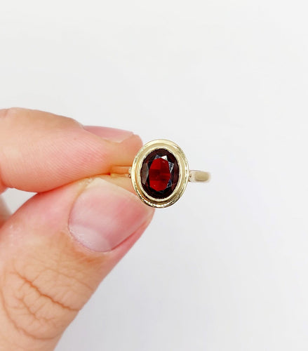 Bague 54.5 Bague vintage en or 14k et grenat serti clos 58 Facettes A07377