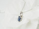 Collier Collier solitaire en or blanc et saphir ovale 58 Facettes 19367