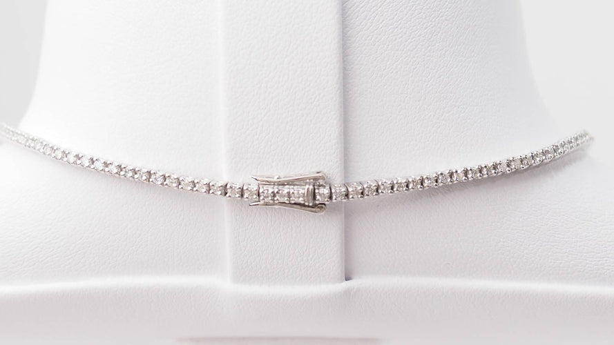 Collier Collier rivière en or blanc et diamants 58 Facettes 32848
