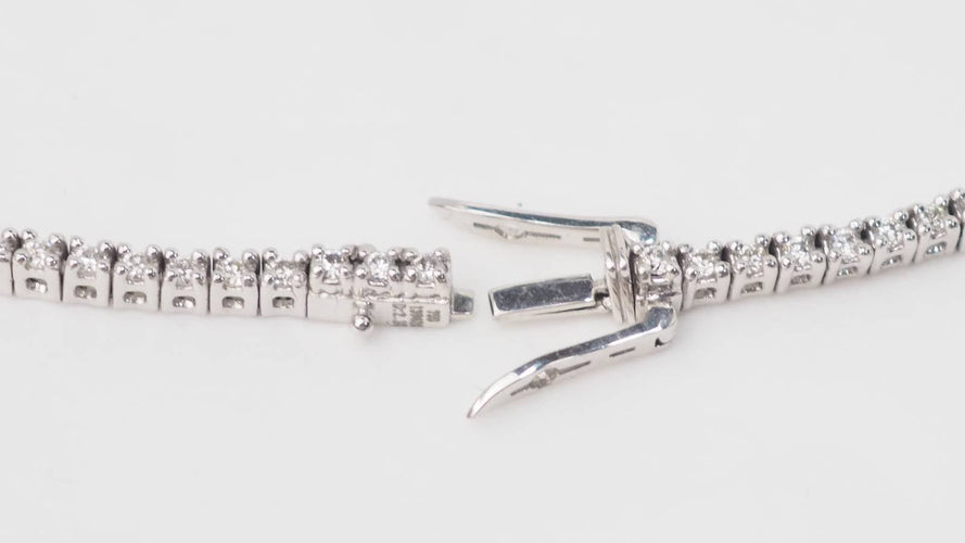 Collier Collier rivière en or blanc et diamants 58 Facettes 32848