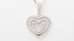 Collier Collier pendentif multi-cœurs en or blanc et diamants 58 Facettes 21089