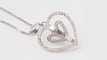 Collier Collier pendentif multi-cœurs en or blanc et diamants 58 Facettes 21089