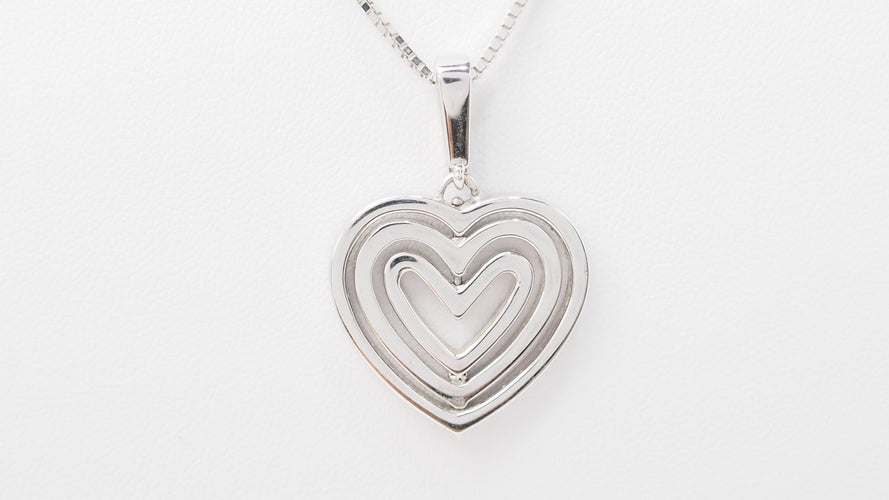 Collier Collier pendentif multi-cœurs en or blanc et diamants 58 Facettes 21089