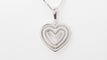 Collier Collier pendentif multi-cœurs en or blanc et diamants 58 Facettes 21089