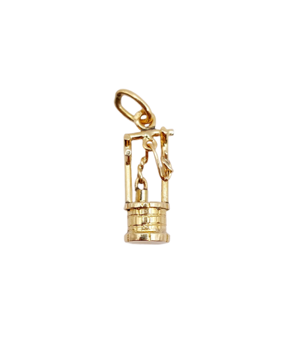 Vintage 18k gold pendant shaped like a well 