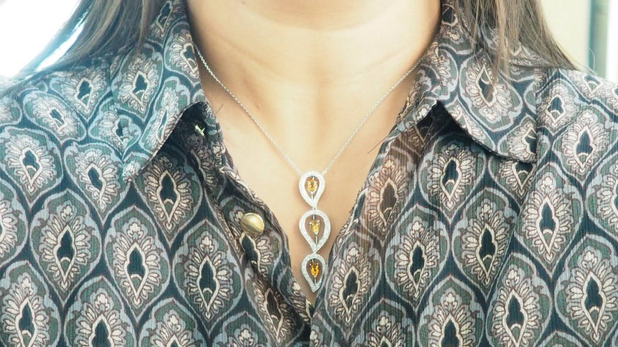 Collier Collier en or blanc, citrines et diamants 58 Facettes 32805b