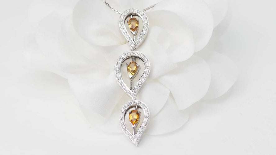 Collier Collier en or blanc, citrines et diamants 58 Facettes 32805b