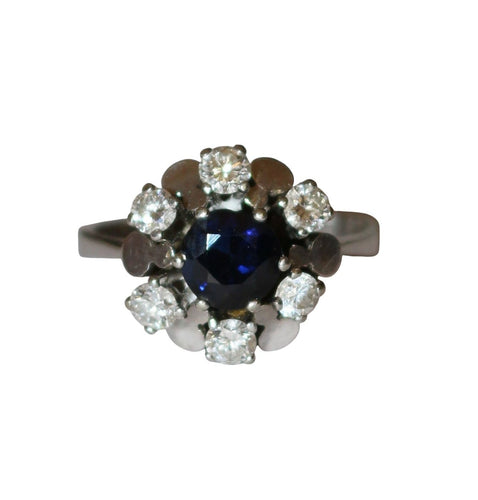 Bague 55 Bague marguerite en or blanc, saphir et diamants 58 Facettes 614