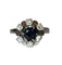 Bague 55 Bague marguerite en or blanc, saphir et diamants 58 Facettes 614