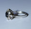 Bague 55 Bague marguerite en or blanc, saphir et diamants 58 Facettes 614