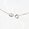 Collier Collier en or blanc avec perle d’eau salée et diamants 58 Facettes D-66612