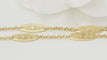 Collier Collier sautoir filigrane en or jaune 58 Facettes 32554