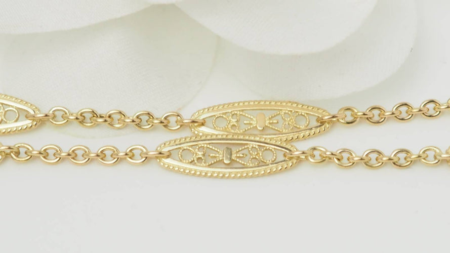 Collier Collier sautoir filigrane en or jaune 58 Facettes 32554