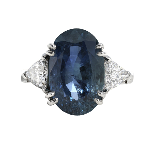 Anillo de oro blanco con zafiro y diamantes 