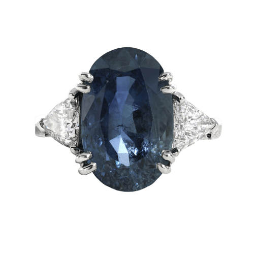 Anillo de oro blanco con zafiro y diamantes 