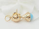 Pendentif Pendentif breloque figurine en or jaune, turquoise et grenats 58 Facettes 33336