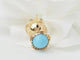 Pendentif Pendentif breloque figurine en or jaune, turquoise et grenats 58 Facettes 33336