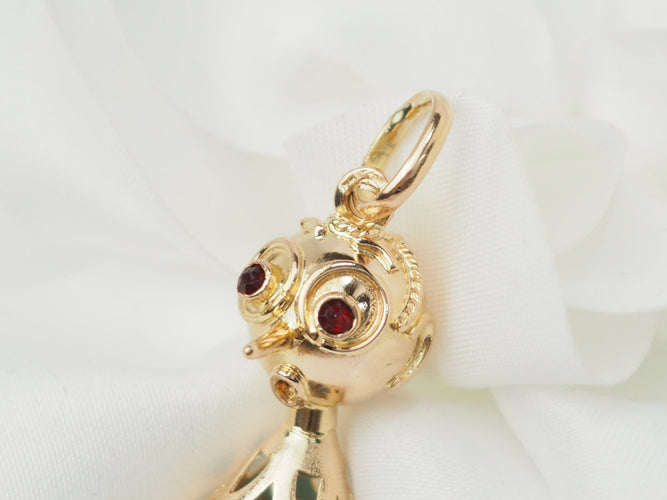 Pendentif Pendentif breloque figurine en or jaune, turquoise et grenats 58 Facettes 33336