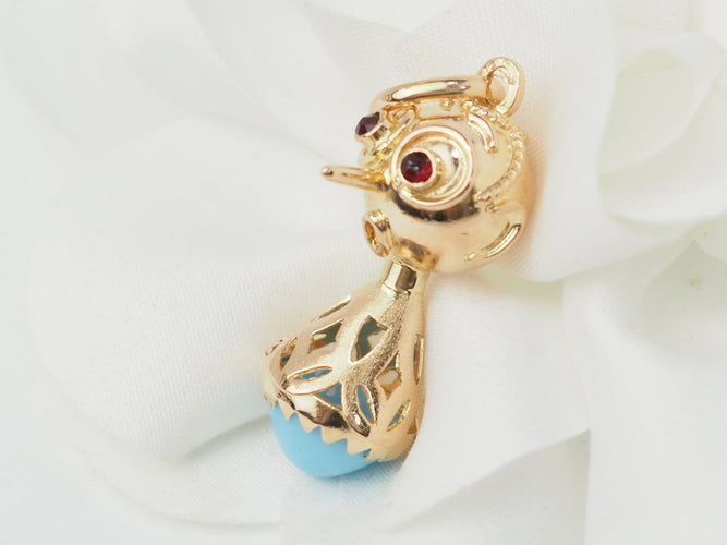 Pendentif Pendentif breloque figurine en or jaune, turquoise et grenats 58 Facettes 33336