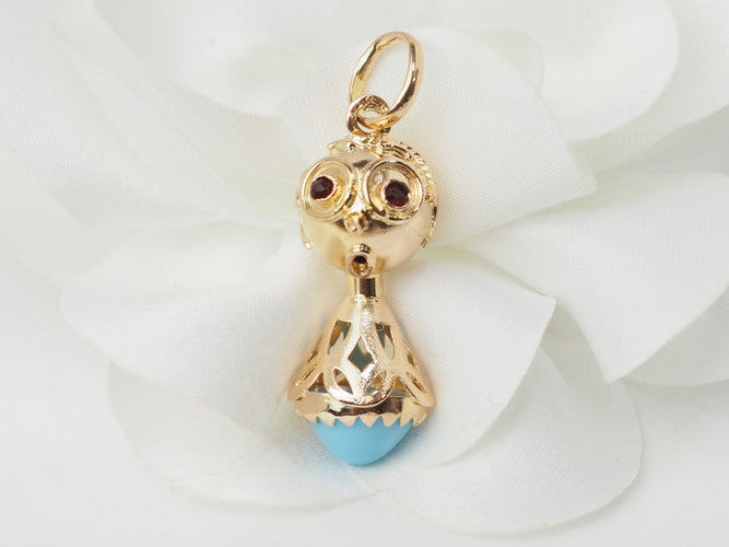 Pendentif Pendentif breloque figurine en or jaune, turquoise et grenats 58 Facettes 33336