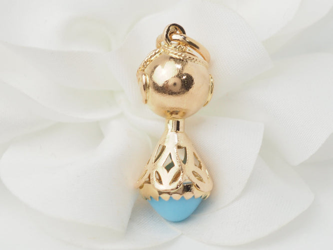 Pendentif Pendentif breloque figurine en or jaune, turquoise et grenats 58 Facettes 33336