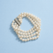 bracelet-vintage-1960-perles-de-culture-fermoir-barrette-or-gris.png