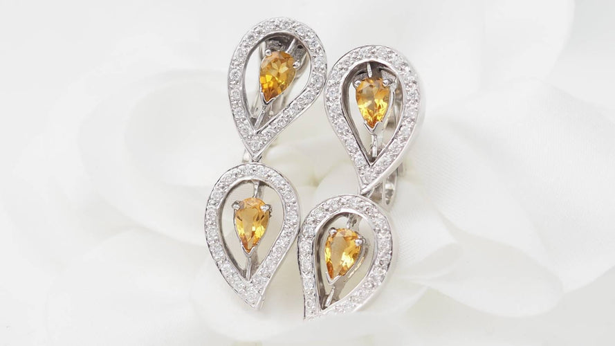 Boucles d'oreilles Boucles d'oreilles pendantes en or blanc, citrines et diamants 58 Facettes 32804