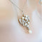 collier_femme_ancien_perles_fines_et_diamants_1800x1800.webp