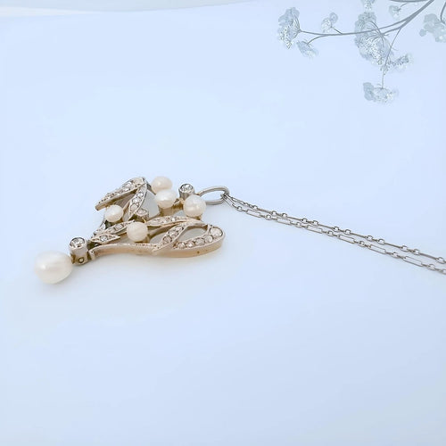 Collier_art_nouveau_or_jaune_18K_et_or_blanc_18_carats_1800x1800.webp