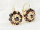 Boucles d'oreilles Boucles d'oreilles dormeuses en or jaune et grenats 58 Facettes 33473