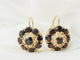 Boucles d'oreilles Boucles d'oreilles dormeuses en or jaune et grenats 58 Facettes 33473