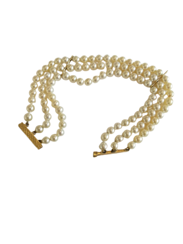 Armband mit 3 Reihen aus Gelbgold und Zuchtperlen 