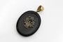 old-secretary-sentimental-medallion-made-of-onyx-with-a-flower-basket-motif-with-rubies-emeralds-and-pearls (3).jpg
