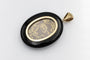 old-secretary-sentimental-medallion-made-of-onyx-with-a-flower-basket-motif-with-rubies-emeralds-and-pearls (4).jpg