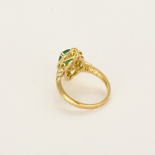 Bague 48 Bague marguerite en or jaune 18K, émeraude et diamants 58 Facettes B260207