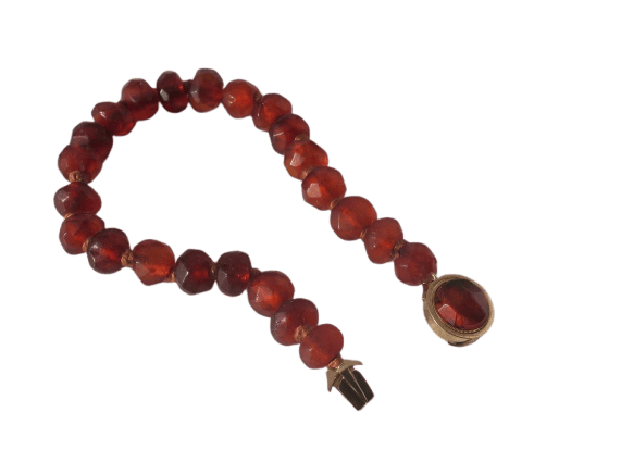 Armband van gefacetteerde barnstenen kralen in roségoud 