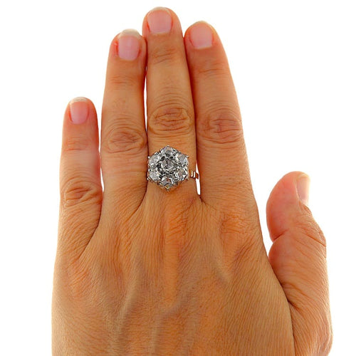 https://www.gioielleriaguidetti.it/wp-content/uploads/2026/06/G3973-anello-stile-antico-oro-rosa-argento-rosette-diamanti-3-1.jpg