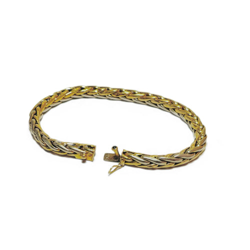 Bracelet Bracelet souple deux ors en or jaune et or gris 58 Facettes REF24058-221