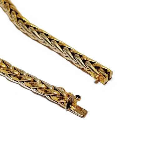Bracelet Bracelet souple deux ors en or jaune et or gris 58 Facettes REF24058-221