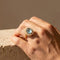 https://cdn.shopify.com/s/files/1/0442/6560/3235/products/extravaganter-vintage-ring-mit-aquamarin-perlen-aus-585-goldhoney-jewelry-4425249.jpg?v=1772565574